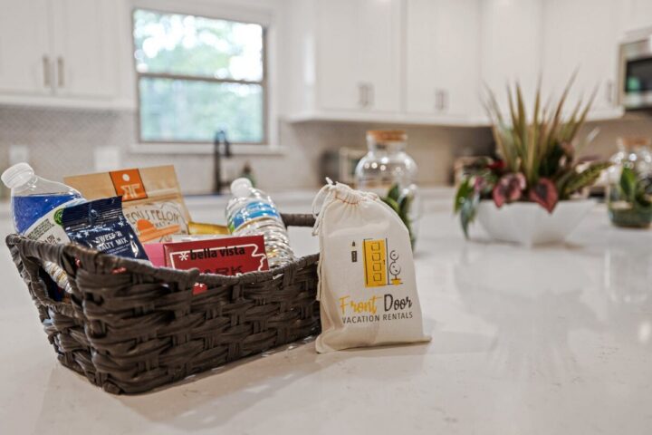 Welcome gift basket with water bottles and snacks at OZ Adventure Retreat vacation rental.