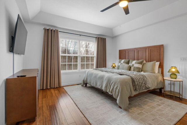 Relaxing bedroom at The Witherby Woodland Retreat, a Bella Vista vacation rental near Back 40 Trails.