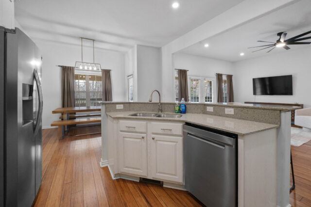 A comfortable kitchen area with modern appliances and open living space at The Witherby Woodland Ret.