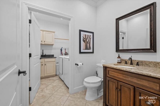 Bright bathroom with white walls, beige vanity, and modern fixtures in Rivercliff Ridgehouse vacatio.