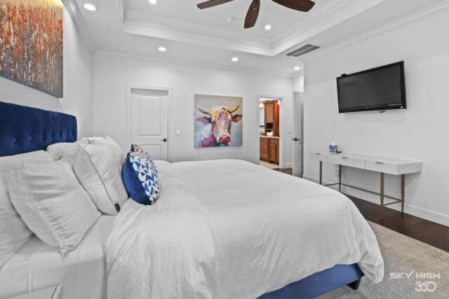 Relaxing bedroom in Rivercliff Ridgehouse with modern decor and scenic views in Rogers, AR.