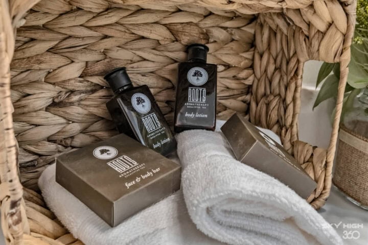 Relaxation spa set with body lotion, soap, and towel at Black Bear Cabin vacation rental.