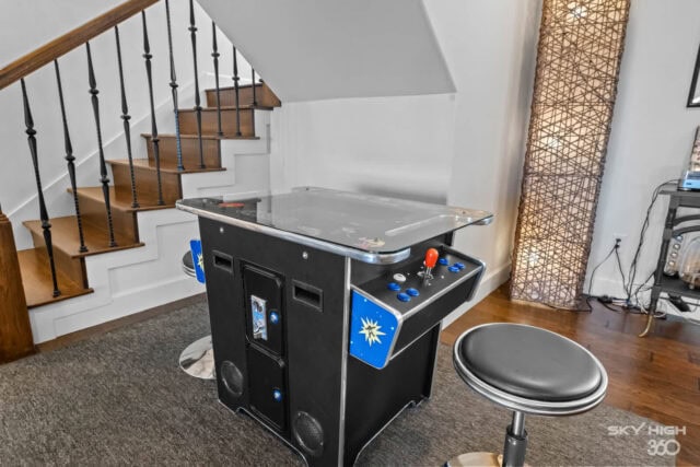 Indoor air hockey table in a cozy vacation rental game room in Rogers, AR.