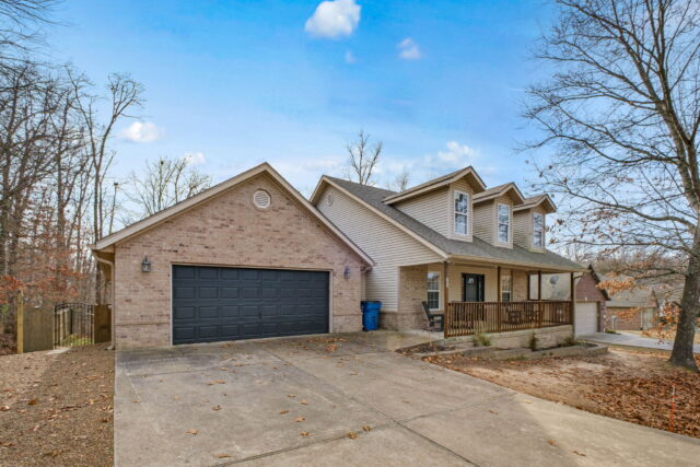 Modern vacation rental home with garage near Back 40 Trails in Bella Vista, Arkansas.