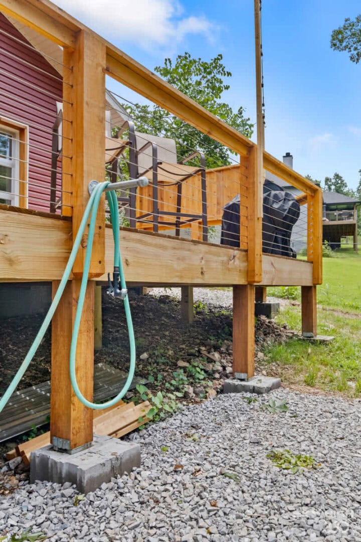 Enjoy outdoor shower at Black Bear Cabin, a bike-in vacation rental near Bella Vista with scenic tra.
