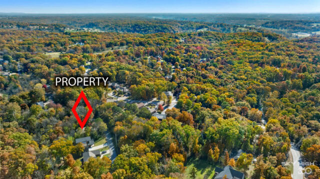 Breathtaking aerial view of wooded property near Ozark Retreat, Bella Vista, Arkansas.