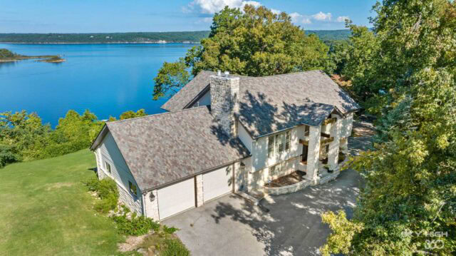 A lush lakeside vacation home with scenic views of Beaver Lake in Rogers, AR.