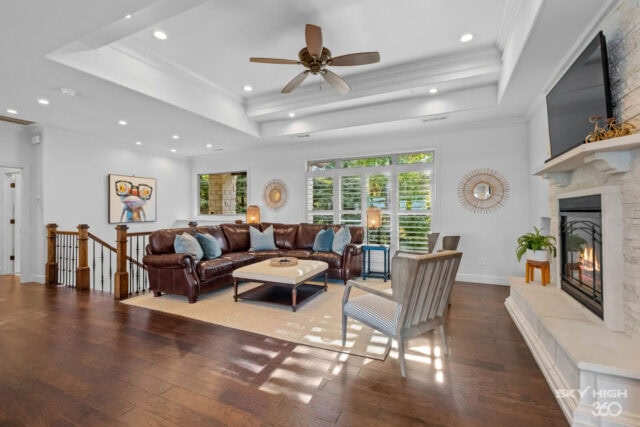 Spacious living room with modern decor and large windows in Beaver Lake vacation rental.